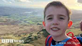 Boy, 6, conquers UK's 12 highest peaks for charity