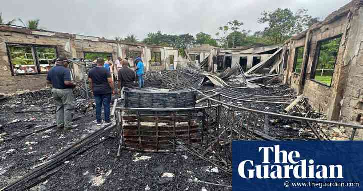Girl, 15, charged with 19 counts of murder after fire at school in Guyana