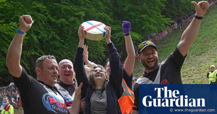 Woman wins UK cheese rolling race despite being knocked unconscious