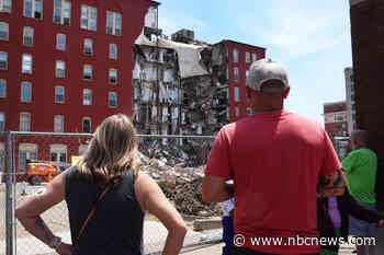 Woman rescued uninjured 24 hours after Iowa building's partial collapse