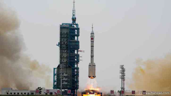 China launches new crew for orbiting space station, looking to put astronauts on moon by end of decade