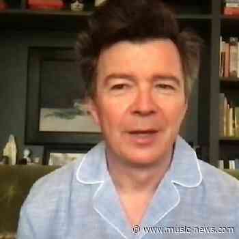 Rick Astley does interview in his Pyjamas and jokes he'll rock them on Glasto stage