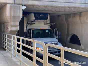 Too-tall truck gets stuck under overpass on Hanna Street
