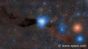 Infant stars burst out of their cosmic cribs in a violent stellar nursery (photo)