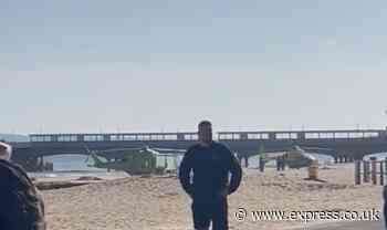 Major air and sea rescue off Bournemouth coast as tourists cleared from beach