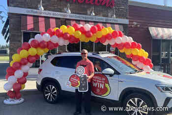 North Okanagan man Rolls Up new Volkswagen with Tim Hortons coffee