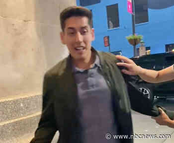 A New York man is fired after a woman accused him of ripping her wig off in the street