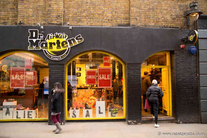 Dr Martens hits £1bn sales milestone but profits tumble