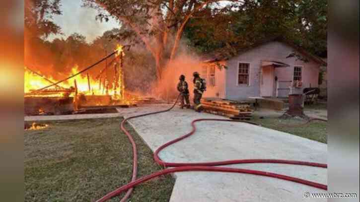 Vacant house ruled total loss after Thursday morning fire that damaged nearby home