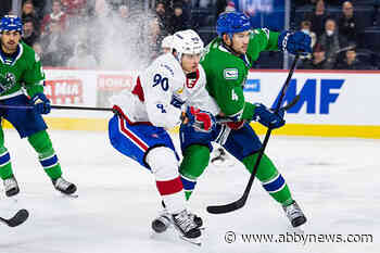 Vancouver Canucks sign defenceman Jett Woo to 1-year contract