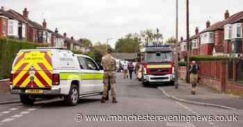 Worried residents 'frantically packing bags' after evacuation as bomb units cordon off roads with major incident declared