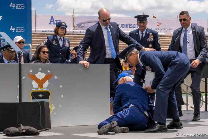 Biden falls on stage at Air Force graduation