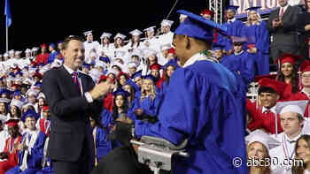 Paralyzed Clovis student walks across stage to get high school diploma
