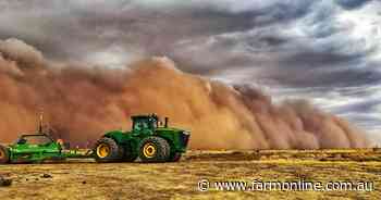 Farmers work to cover up loose soils to prevent dust storms