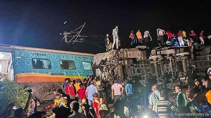 Passenger train derails in India, killing at least 50 and trapping many others