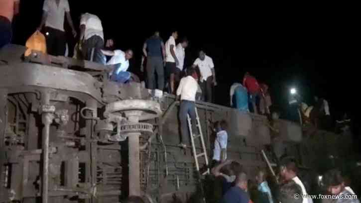 Dozens feared dead in India after passenger, freight trains collide