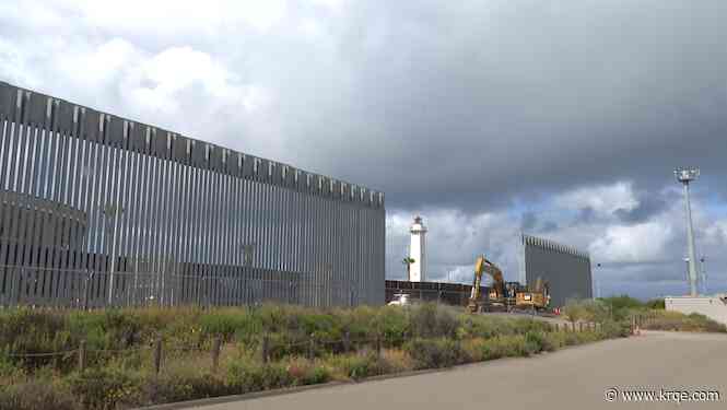Taller border wall panels going up at iconic beach location angering opponents
