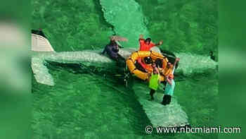 U.S. Coast Guard rescued five people from sea while sitting on the wing of crashed airplane