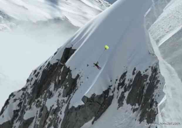 Skier Holds On For Dear Life To Attempt Peak's First Ski BASE Jump
