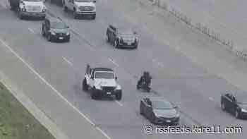 Slow-speed scooter chase down busy interstate ends with arrest