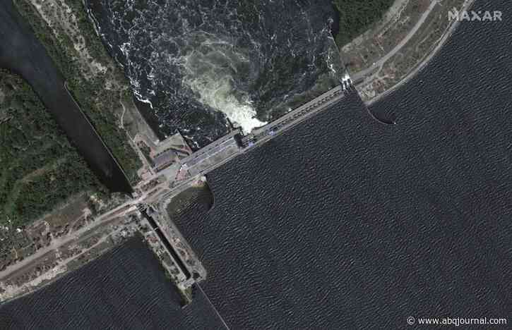 Zelenskyy visits area flooded by destroyed dam as five reported dead in Russian-occupied town