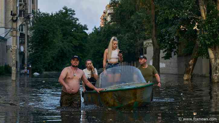 Ukrainians escape flooding after dam collapses, as many as 20,000 need to relocate