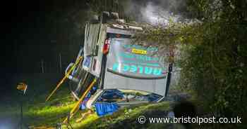 Four charged over school bus crash which left vehicle overturned