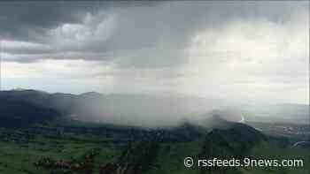 Hail, heavy rain fall across parts of the Front Range