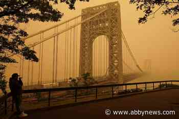 Smoky haze blanketing US and Canada could last into the weekend