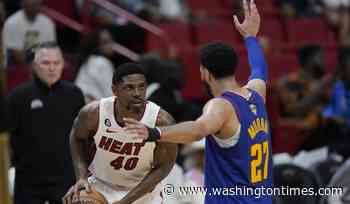 Haslem spent entire career with Heat, but almost went to the Nuggets
