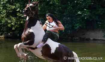 All the photos as travellers on horseback gallop through river at the Appleby Horse Fair