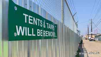 Signs of tension: Tent removal warnings in Edmonton's Chinatown worry some advocates