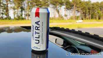 Driver accused of being impaired with open liquor in vehicle charged with stunt driving on Hwy 400