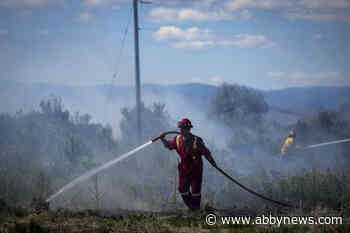 Eyes on the weather as fierce wildfire rages, forces evacuations in northeastern B.C.