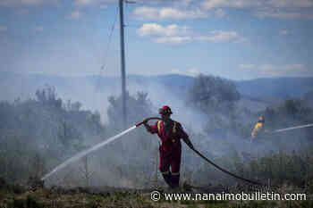 Eyes on the weather as fierce wildfire rages, forces evacuations in northeastern B.C.