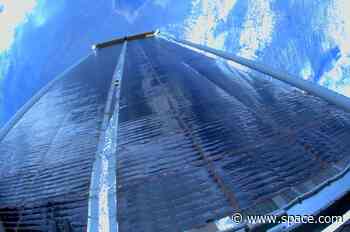 NASA astronauts deploy 5th roll-out solar array on spacewalk outside space station (video)