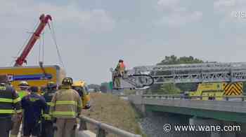 WATCH: Driver crashes into RV, becomes suspended over bridge on Indiana Toll Road
