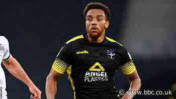 Donovan Wilson: Grimsby Town sign Sutton United striker