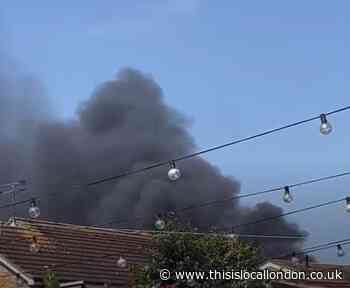 Rainham industrial yard fire produces thick clouds of smoke