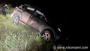 Police officers rescue elderly man as car nearly rolls over him on Florida canal bank