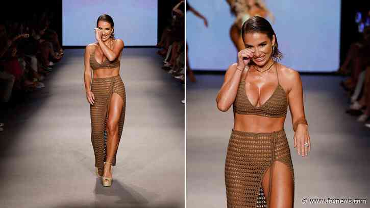 Jessie James Decker wipes a tear, struts her stuff during swimsuit runway show