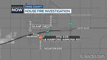 Crews investigating what caused a vacant house fire in Hanford