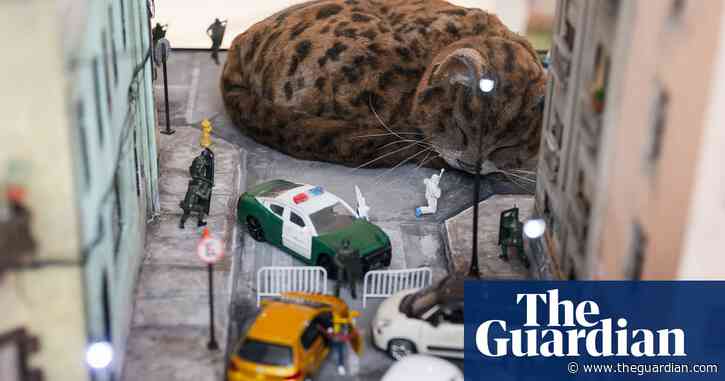 Incredible scenes! Prague stages design spectacular with a giant cat, tiny flats and a 16-legged theatre