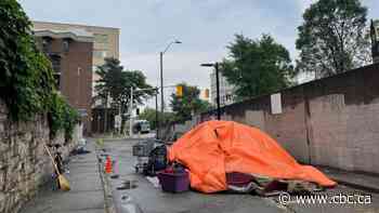 As Hamilton seeks public input on encampments, it's getting those living in tents outside city hall to leave