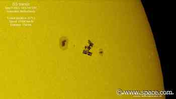 Wow! Amazing video shows ISS crossing the sun's face during a spacewalk