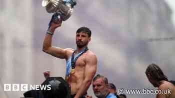 Manchester City fans and players celebrate historic Treble in the rain
