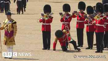 Trombonist soldier tries to play on after fainting