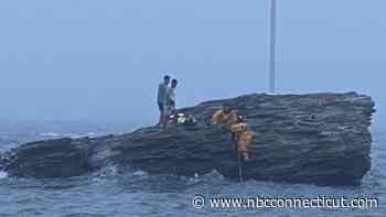 Crews rescue several people stranded at beach in Milford