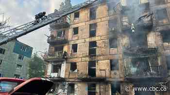 Russia strikes civilian buildings in Zelenskyy's hometown, killing at least 11