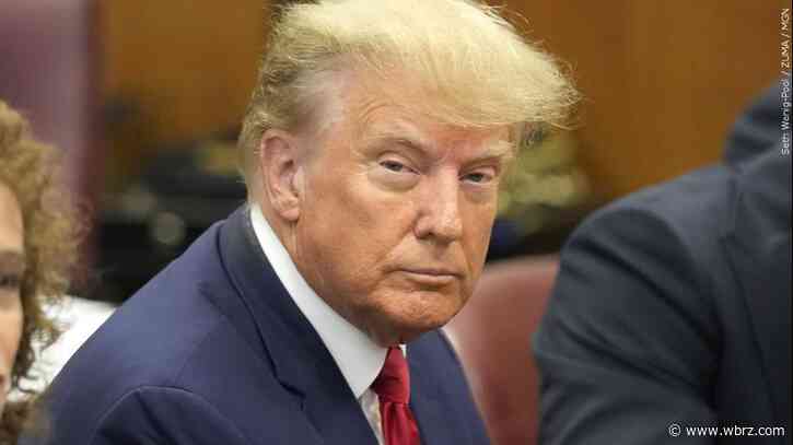 Trump arrives at Miami court for historic appearance over charges he hoarded secret documents